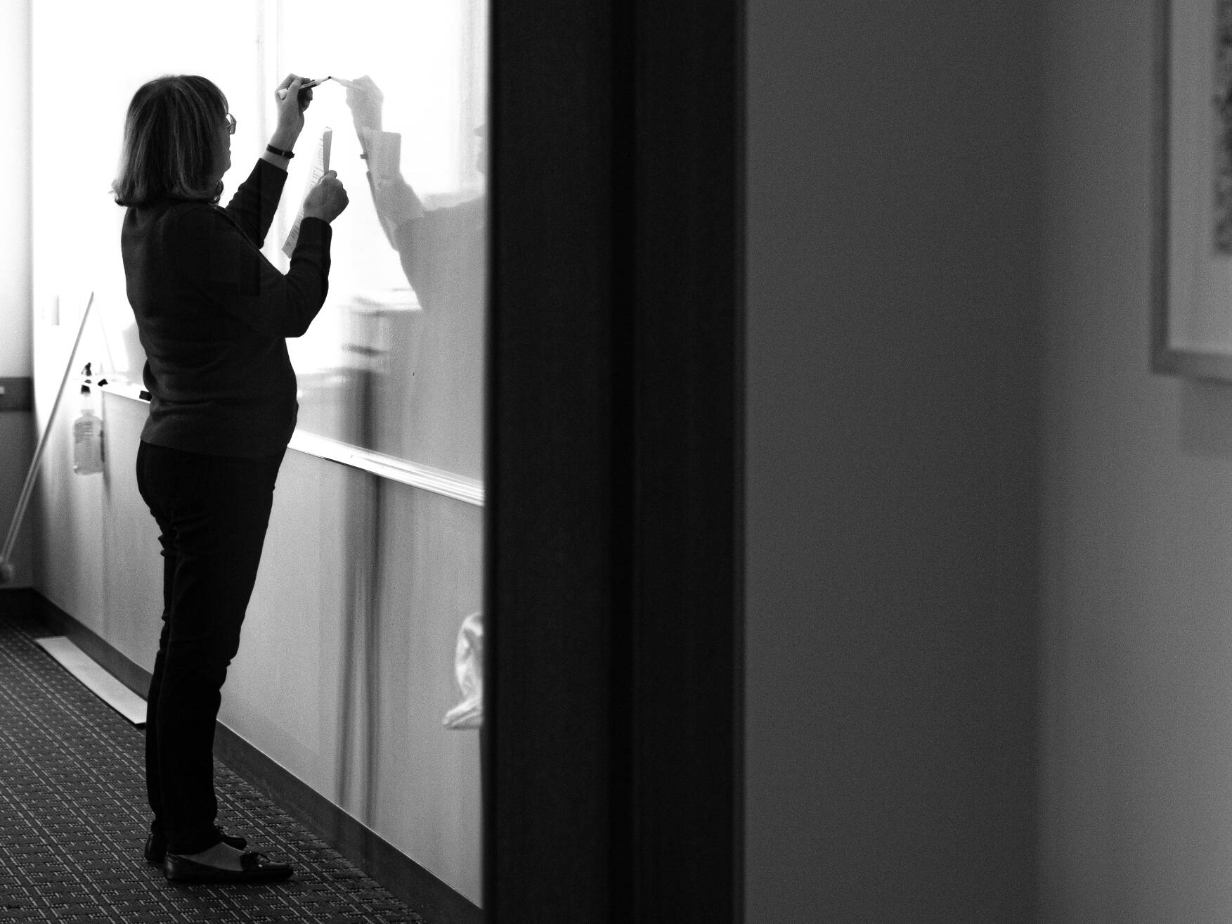 Faculty Writing on Whiteboard
